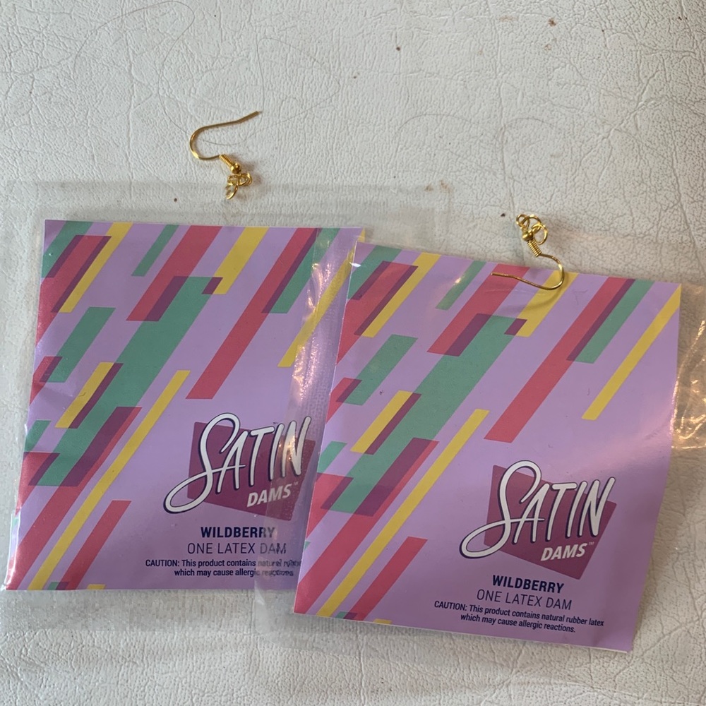 Dental fam earrings